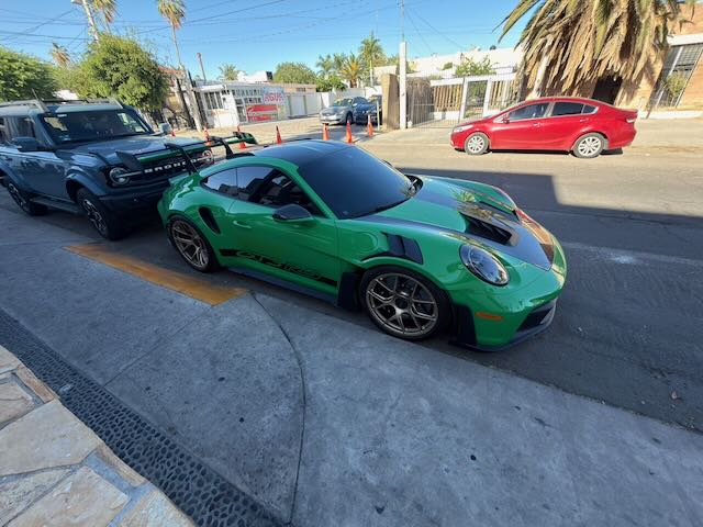 Carín León's 2025 Porsche GT3RS parked outside Marbella 45